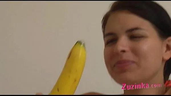 How-to: Young brunette girl teaches using a banana Video baru yang besar