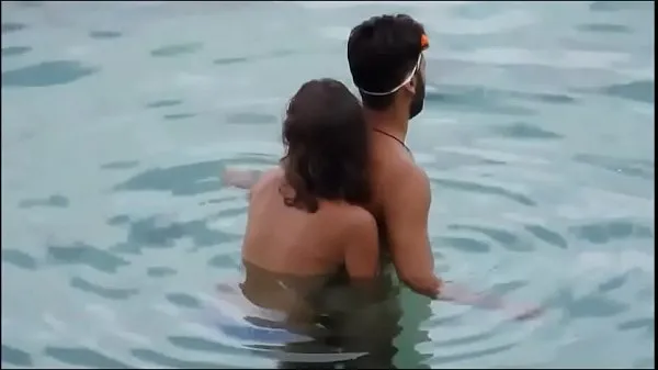 Girl gives her man a reacharound in the ocean at the beach - full video xrateduniversity. com Video baharu besar
