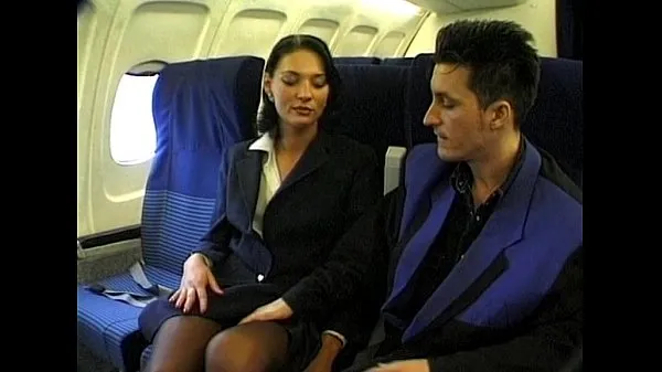 بڑے Brunette beauty wearing stewardess uniform gets fucked on a plane نئے ویڈیوز
