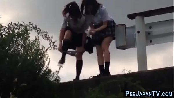 Büyük Kinky asians urinating outdoors yeni Video