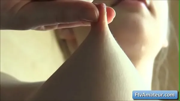 Sexy young blonde teen amateur Alana play with her hard perky nipples and gets fully naked Video mới lớn