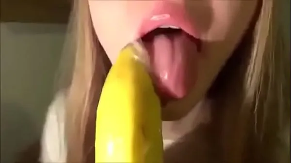 Big Cute Girl Sucking a Banana with Condom new Videos