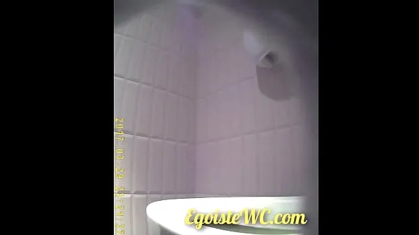 The camera in the women's toilet filmed the beautiful vaginas of girls close-up مقاطع فيديو جديدة كبيرة