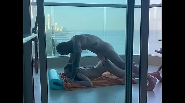 On a balcony in Cartagena, a young student gets her pretty little ass filled Video mới lớn