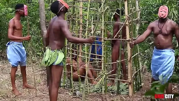 Somewhere in west Africa, on our annual festival, the king fucks the most beautiful maiden in the cage while his Queen and the guards are watching Video baru yang besar