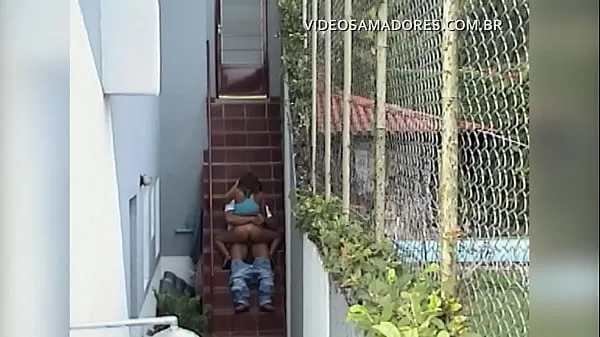 Duże Young couple fucks in the backyard and is filmed from afar nowe filmy
