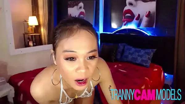 Gorgeous TS in White Bikini Faces the Camera and Jerks off Video mới lớn